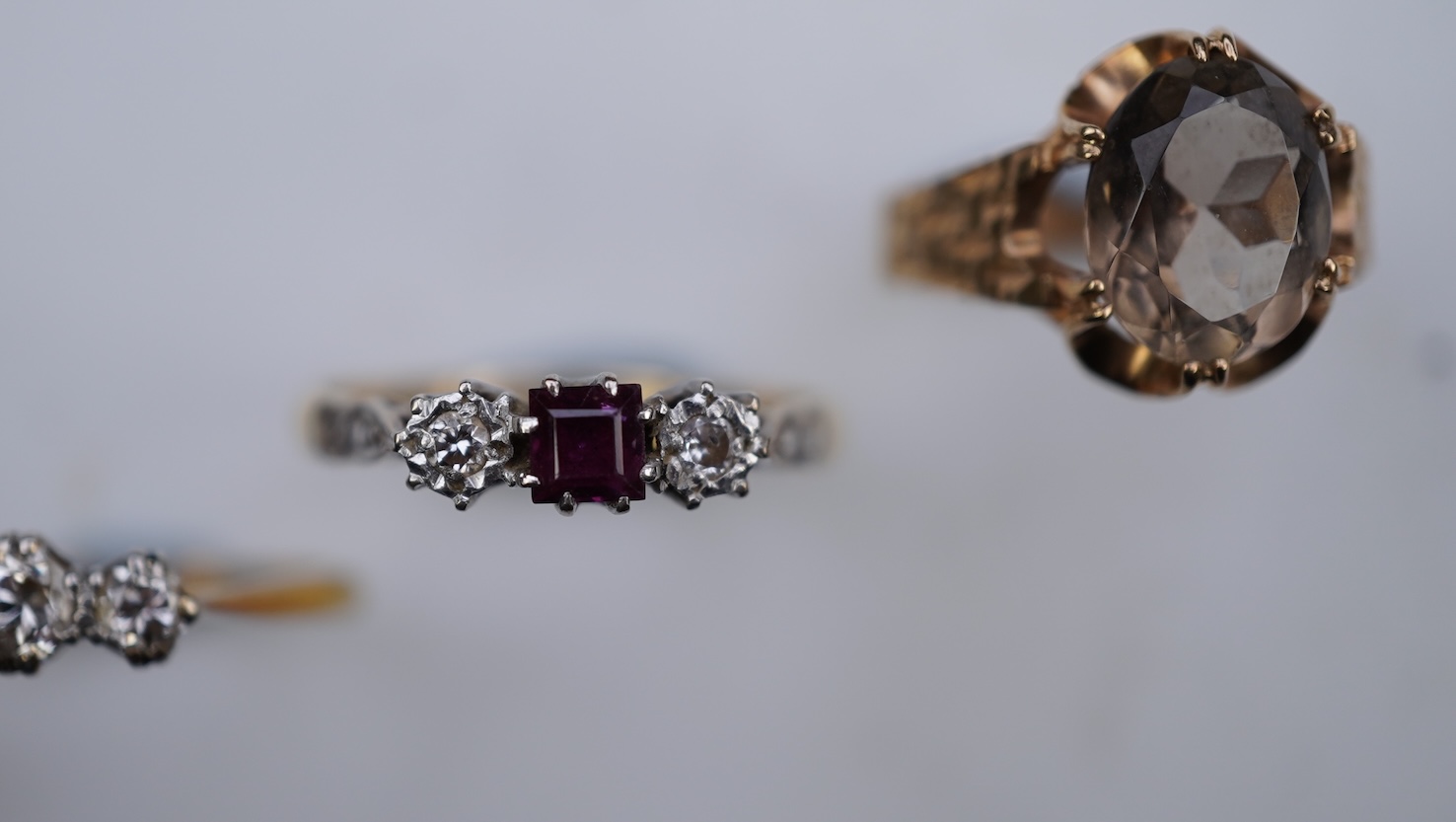 Four gem-set rings